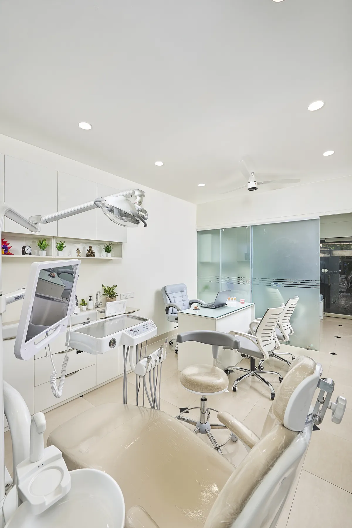 Operatory with dental chair and equipment at White & Co. Dental Clinic